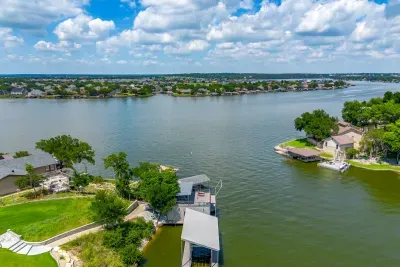 Sparkling open water wrapping around the lakefront lot