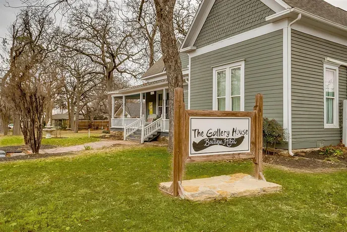 The signature Gallery House sign welcomes you to your elegant boutique hotel experience