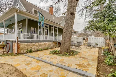Another view of the expansive rock patio, perfect for gathering with friends or enjoying a quiet moment outdoors