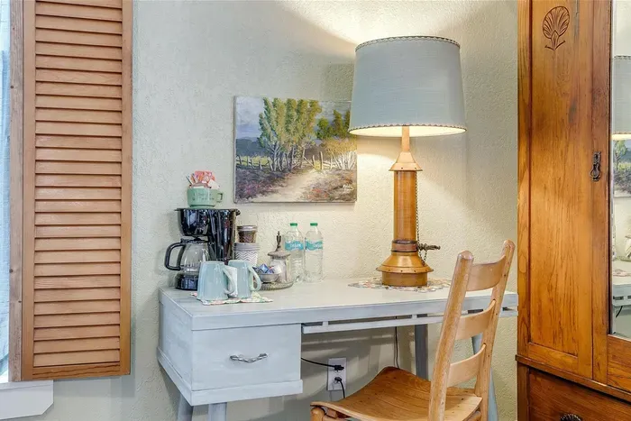 Convenient in-room coffee station, fully stocked for your morning pick-me-up without leaving your suite