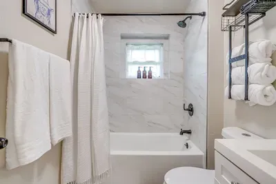 Fluffy towels, shampoo, conditioner, and soap—everything you need for a hotel-quality stay
