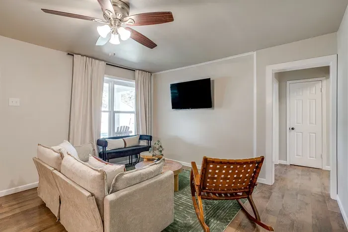 Second living room with smart TV, cozy couch, and plenty of space to unwind