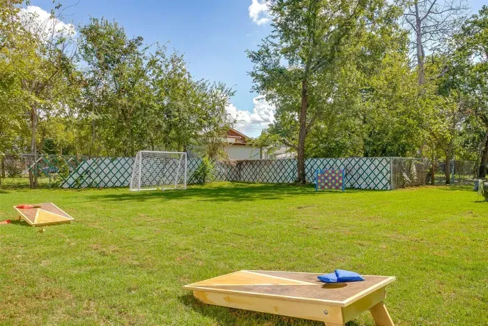 Private fenced yard with cornhole and soccer goal—fun for the whole family