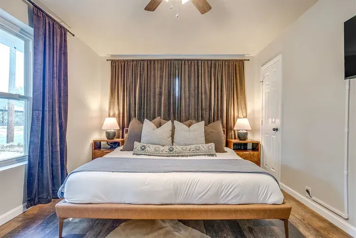 Master bedroom with a plush king bed and peaceful atmosphere for restful nights