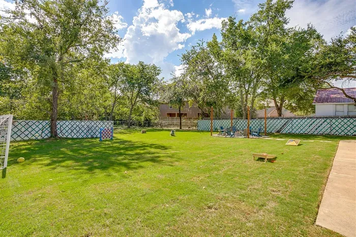 Oversized Connect 4 and yard games make this backyard a guest favorite