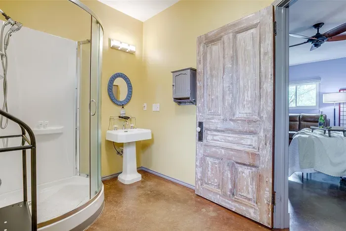bathroom with antique door