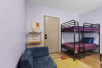 Twin bunk beds are perfect for kids or extra guests, tucked into their own nook for added privacy.