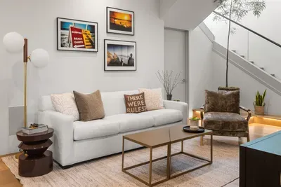 Sleeper sofa makes out to a queen bed