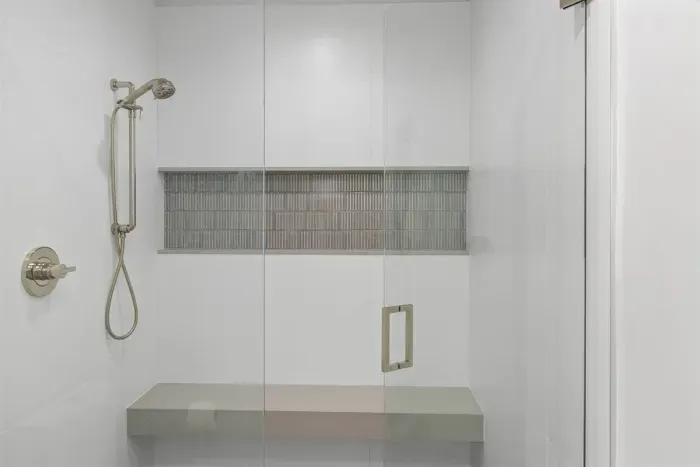 Walk-in shower with a bench