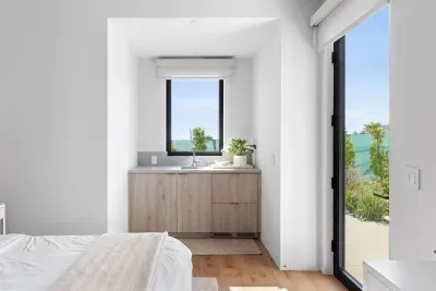 Custom-built in cabinets with refrigerated drawers for your Luxe experience