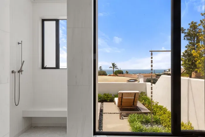 Ocean views from your primary bathroom