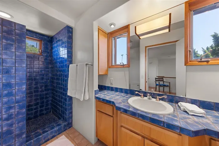 Second-floor bathroom with walk-in shower/hand-held shower head