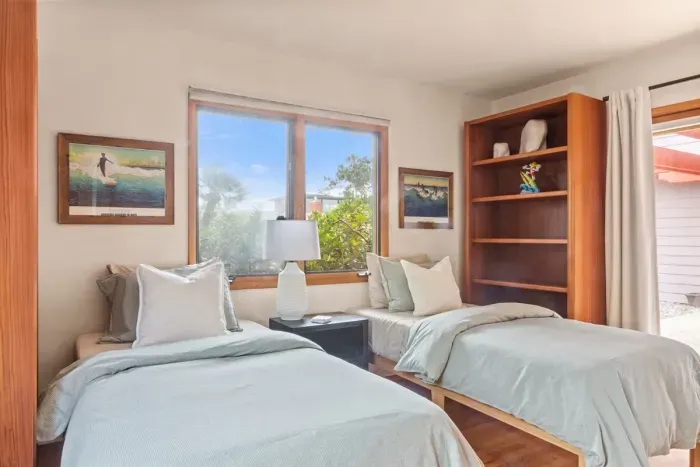 Downstairs guest bedroom with two twins