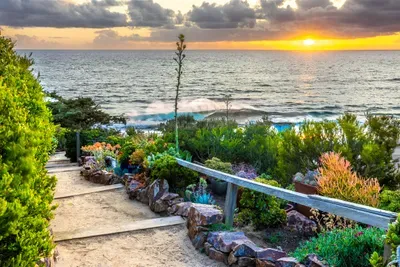 This lush private path leads from the house to Seaside Beach