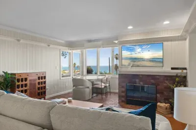 Large living room with sofa sleeper (fireplace is non-operational)