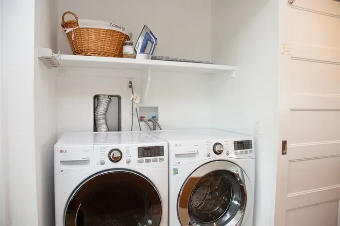 Laundry room behind the barn doors