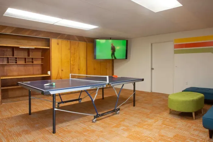 Downstairs game room with Ping Pong and Smart TV