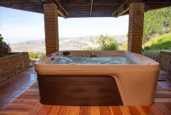 Jacuzzi & outdoor shower off the game room downstairs