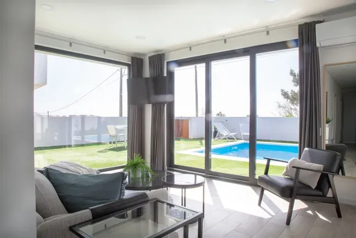 Smart TV and Retractable doors to the fenced outdoor area