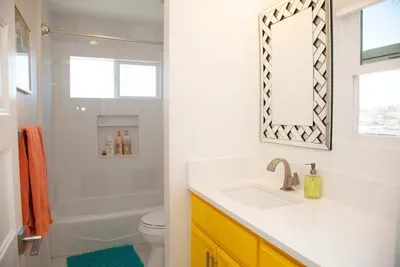 Full guest bath with shower and bathtub