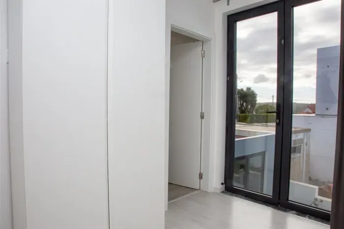 Closet and ensuite bathroom - primary
