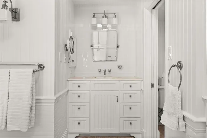 Vanity and walk-in toilet