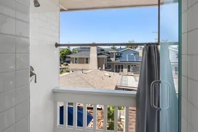 From the primary shower, you may also use the outdoor shower :)