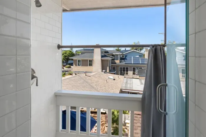 From the primary shower, you may also use the outdoor shower :)