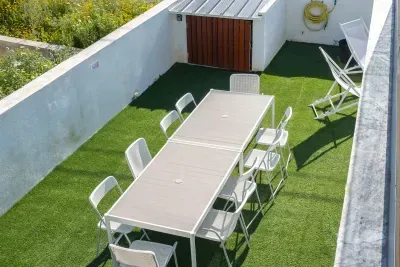 Outdoor dining for 16! (both tables)