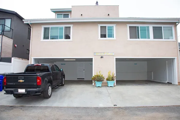 Four parking spots in the carport and four more in the driveway