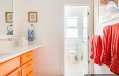 Main floor bathroom with bathtub and shower