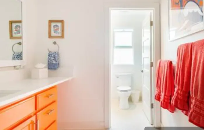 Main floor bathroom with bathtub and shower