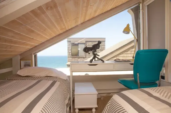 The loft is above the king bed in the Primary bedroom