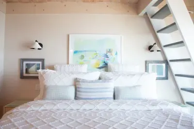 Primary Bedroom with stairs up to the loft