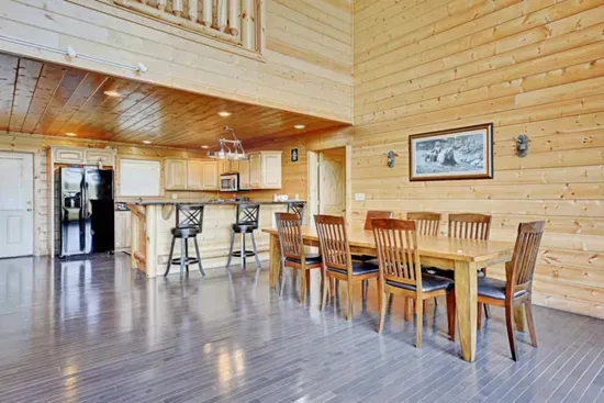 Seating for 10 at long dining table and bar top
