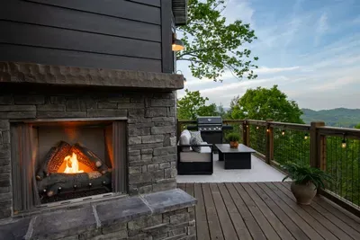 Outdoor Fireplace • Lounge Seating • Mountain Views