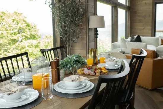 Gather around the table—this cozy dining space seats six for memorable meals together