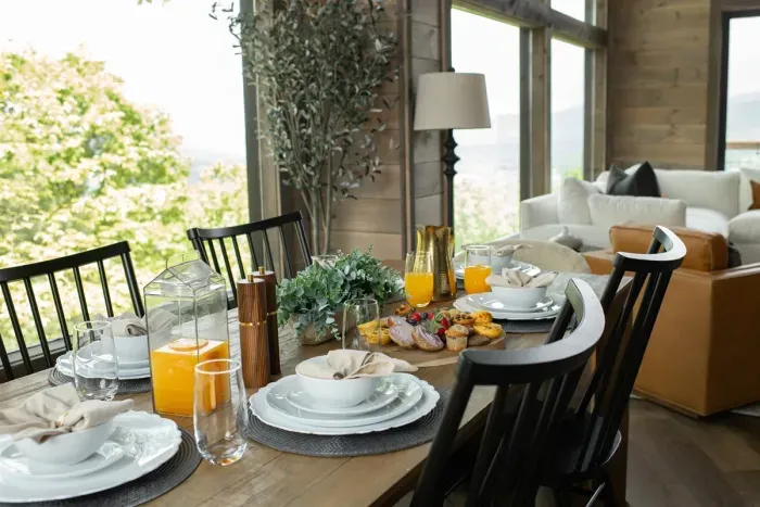 Gather around the table—this cozy dining space seats six for memorable meals together