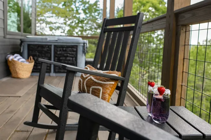 Unwind under the stars in your private hot tub with stunning mountain views.