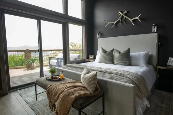 Wake up to breathtaking mountain views and step onto your private deck with a cozy outdoor fireplace