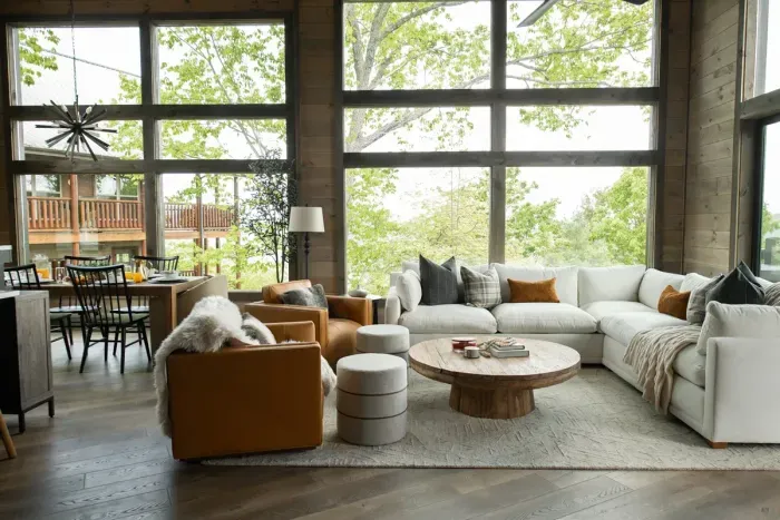 Cozy living room with comfortable sofa and swivel chairs—perfect for relaxing after a day of exploring