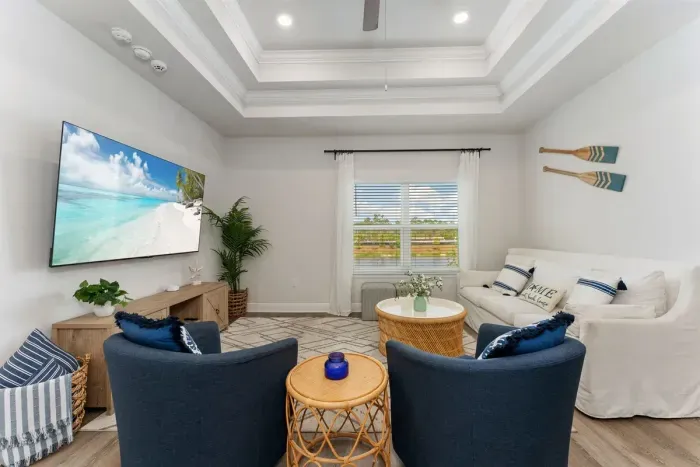Spacious living room with a 75" TV—great for winding down with a movie after a day at the beach