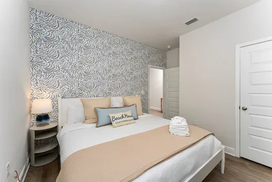 Retreat to a cozy king bed and enjoy movie nights from the comfort of your room