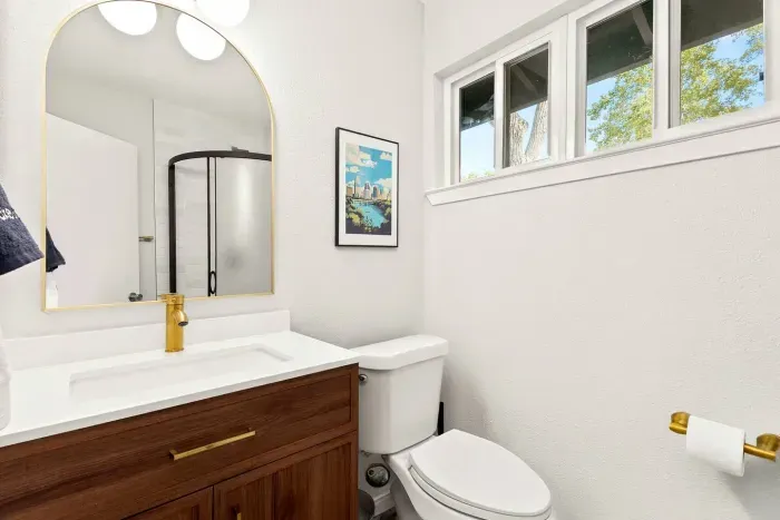 full bathroom with shower + essentials