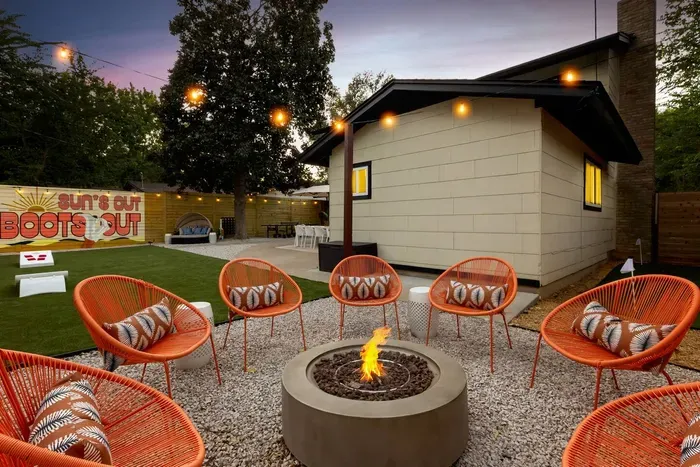 cozy fire pit under string lights