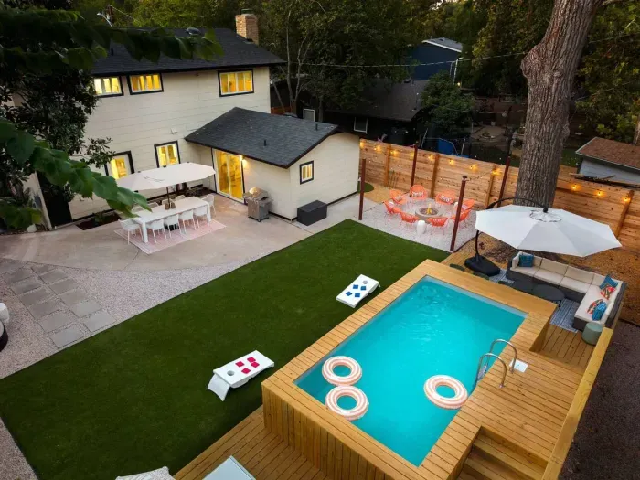 private resort-style backyard with heated pool & sun deck