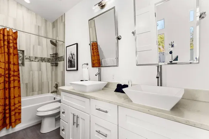 full hallway bathroom upstairs with double sinks