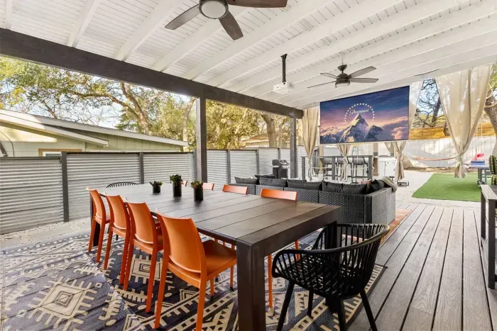 large outdoor dining table and sectional sofa