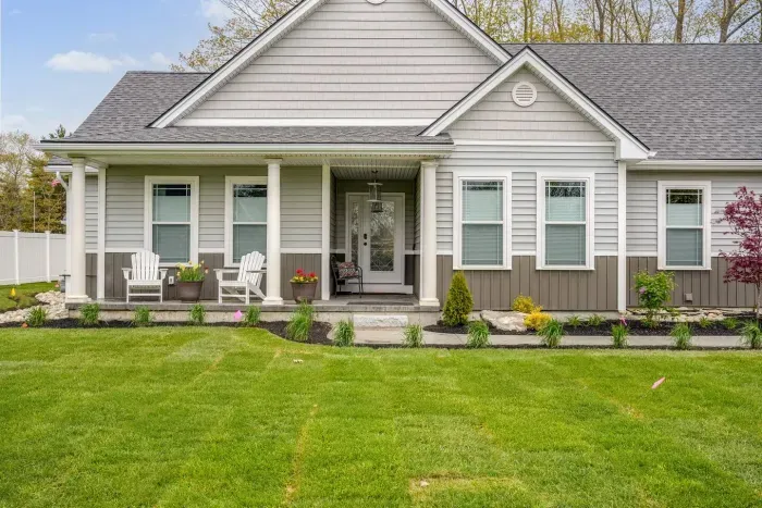 Enjoy the expansive outdoor space with a sunny lawn, patio dining set, Adirondack chairs, and a grill—perfect for barbecues, relaxing afternoons, and memorable evenings with friends and family.