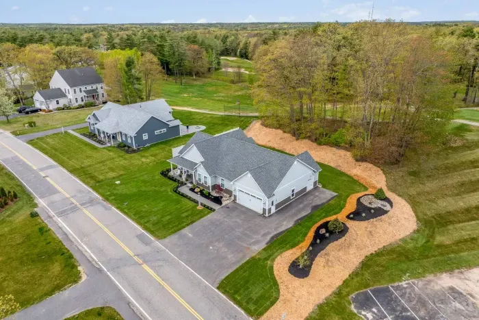 Enjoy the expansive outdoor space with a sunny lawn, patio dining set, Adirondack chairs, and a grill—perfect for barbecues, relaxing afternoons, and memorable evenings with friends and family.